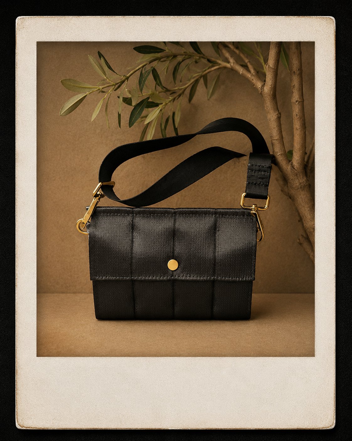 Seatbelt Foldover Crossbody Clutch - Black with Gold Hardware